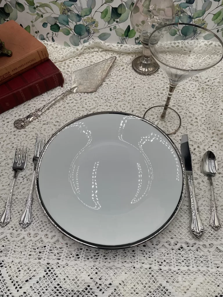 white and silver rim plates vintage table decor from Crate & Barrel vintage Christmas tablescape retro wedding DIY white and silver retro plates