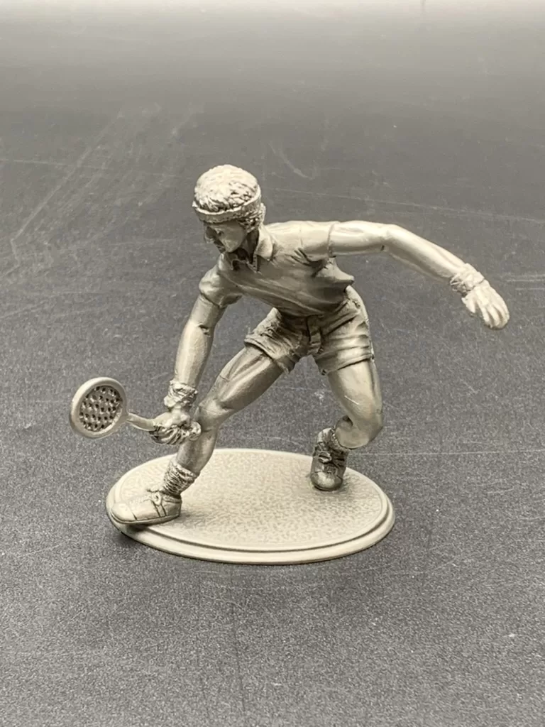 Vintage figurine tennis player